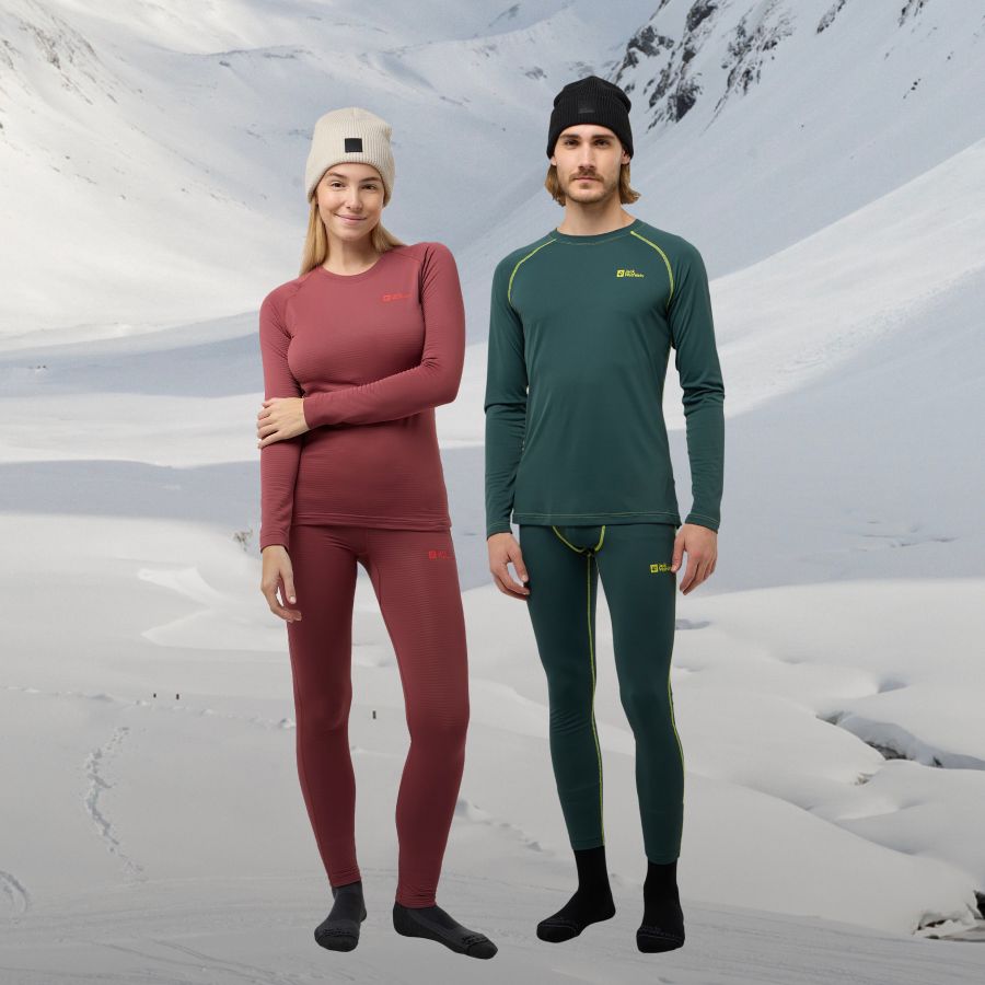 Mujer y hombre con prendas de abrigo Baselayer